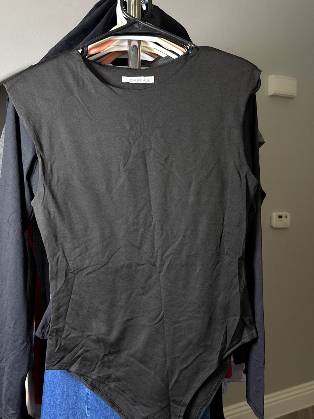 ReoRia Black Sleeveless Crewneck Bodysuit